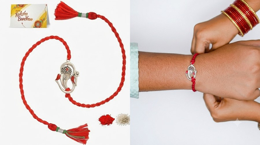 MEENAKARI HERITAGE silver Ganesha rakhi with red thread, tied on a brother's wrist (Roopalia review)