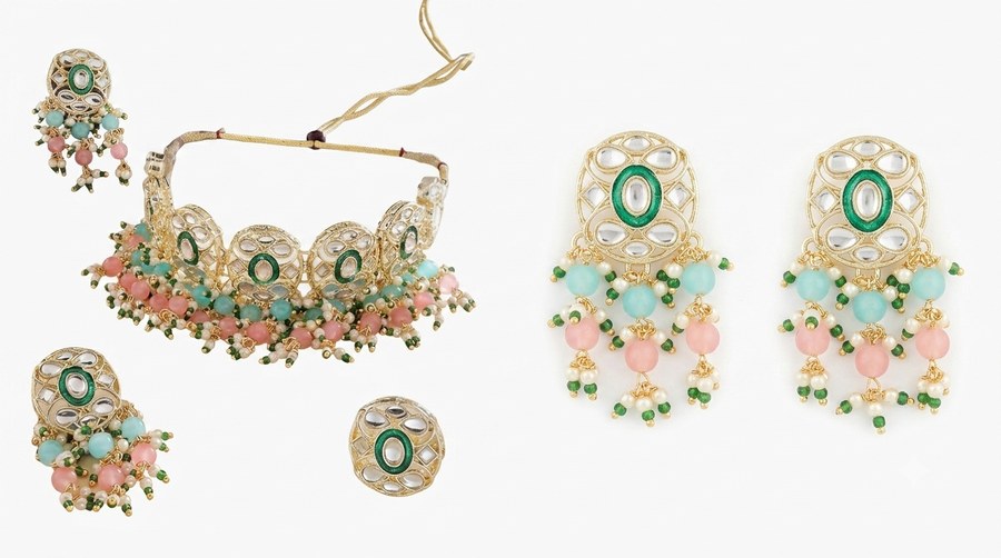 All pieces of the ZAVERI PEARLS kundan choker set laid out — choker, earrings, maang tikka and ring (Roopalia)